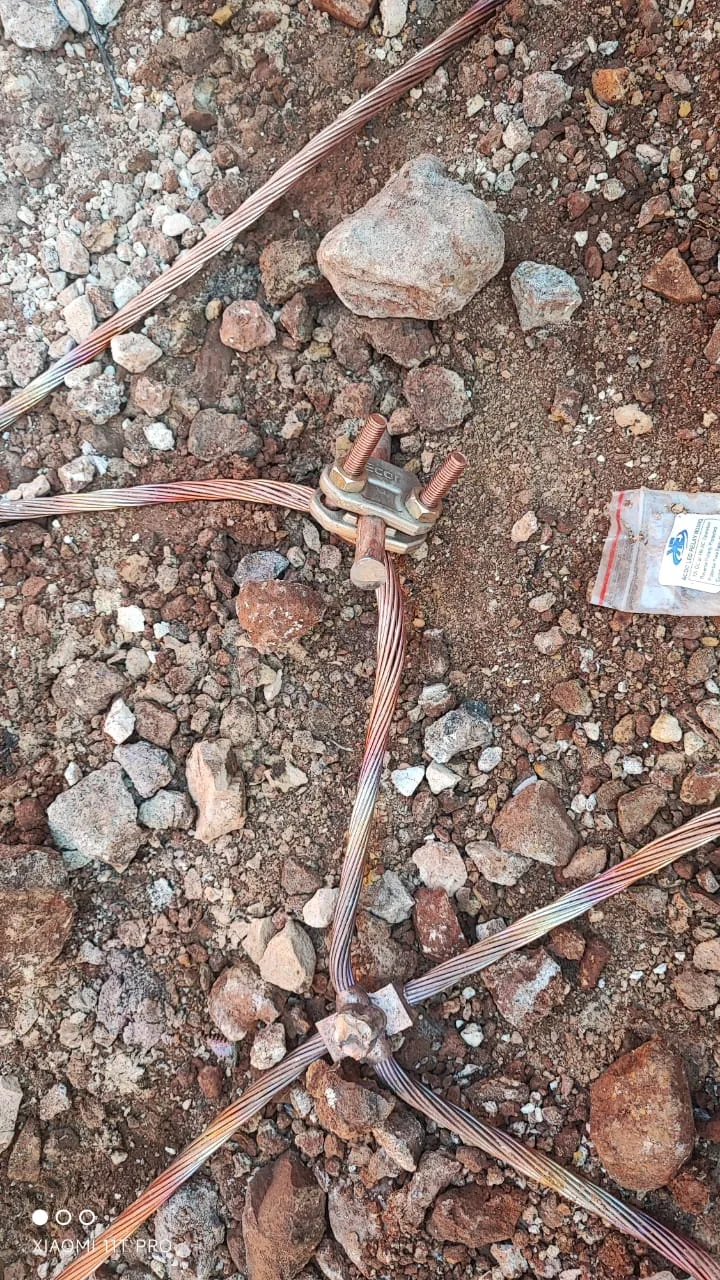 Earthing conductor clamped from the earth mat down to the earth spike.